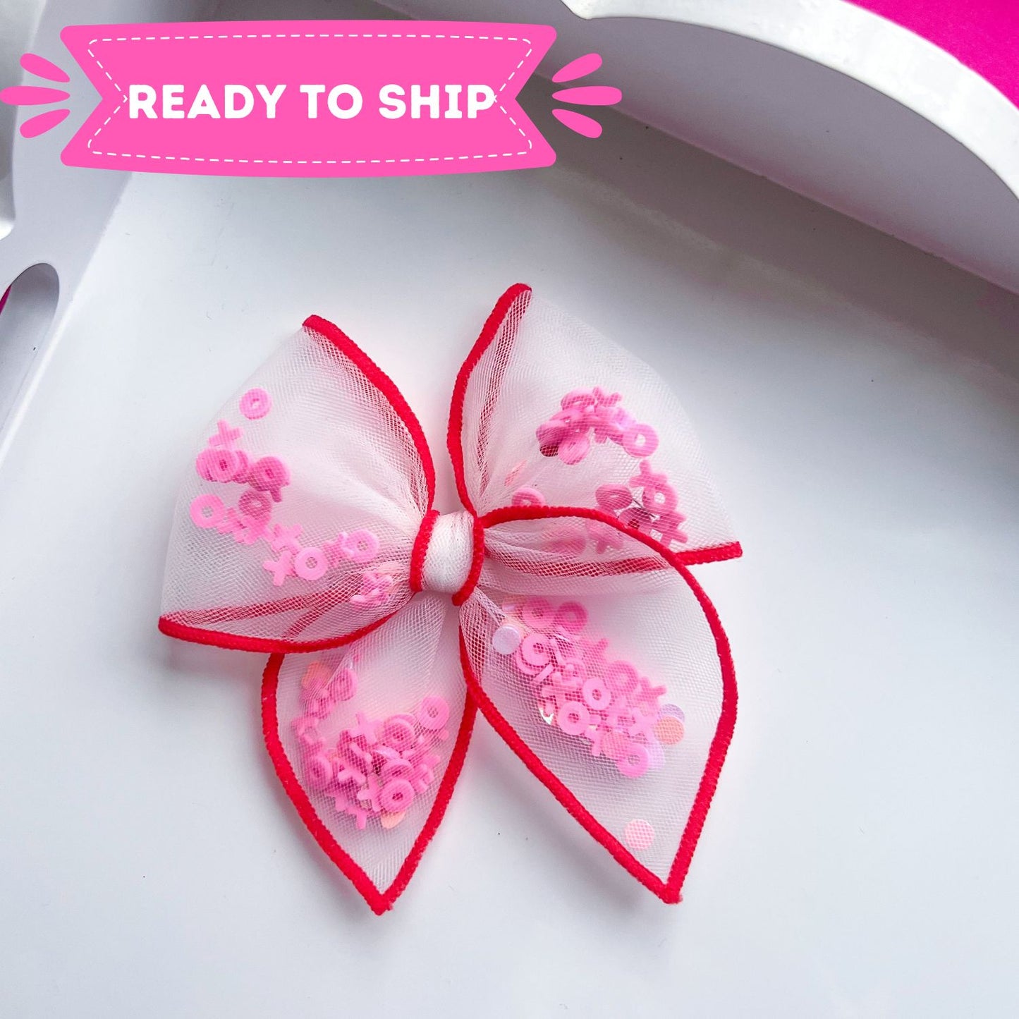 Pink XO Shaker Bow